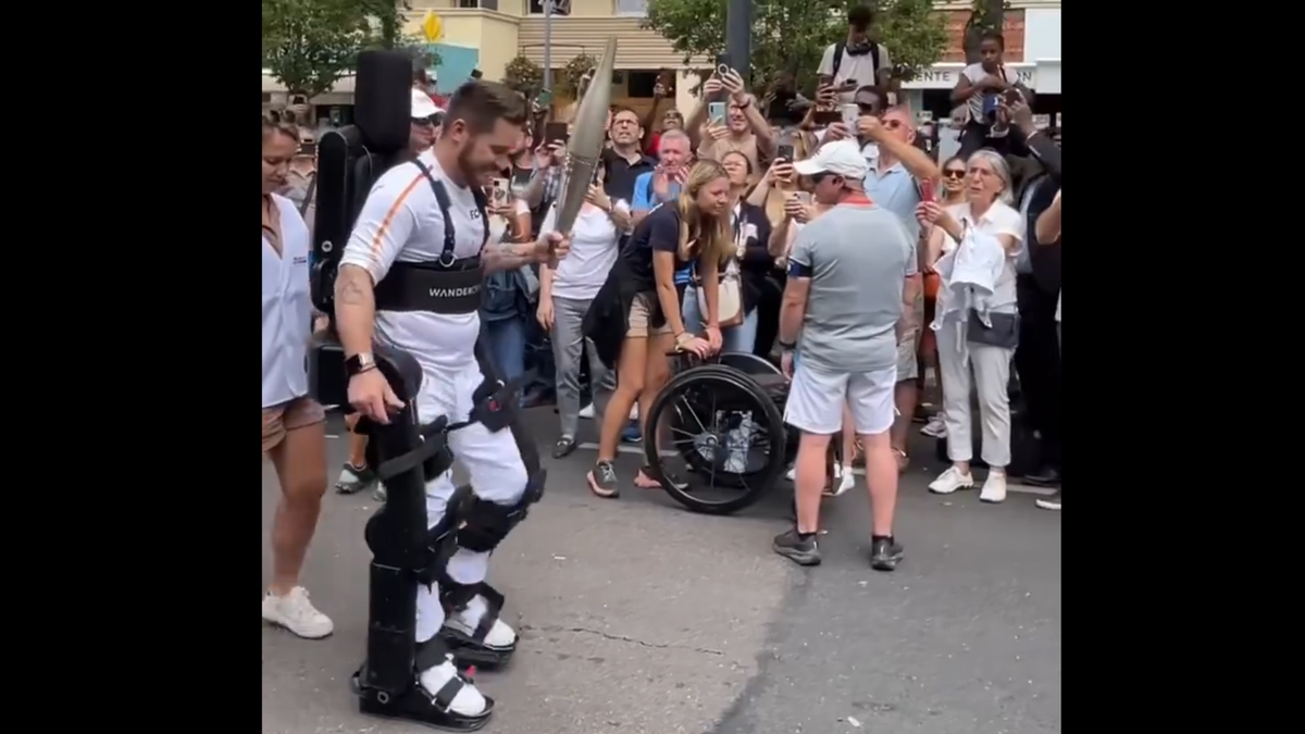 Paraplegic Tennis Player Pilots A Mech To Carry The Olympic Torch