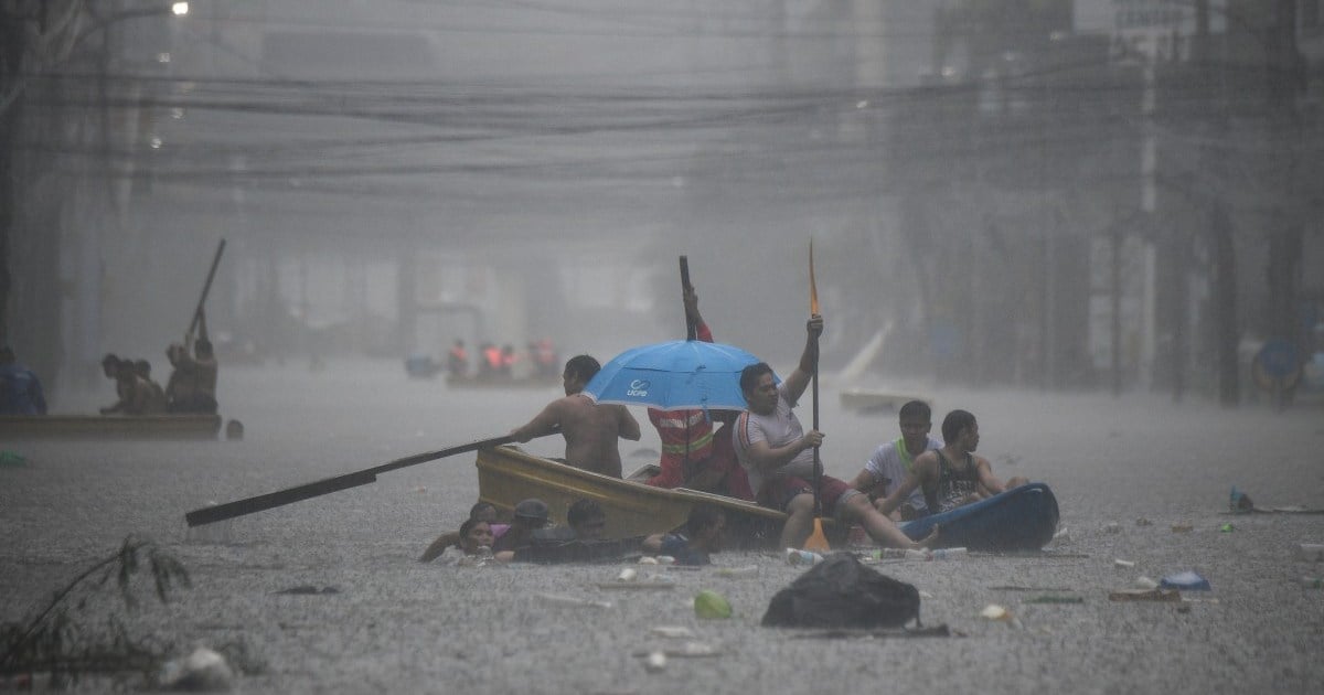 Streets turn into rivers as Typhoon Gaemi sweeps over Philippines
