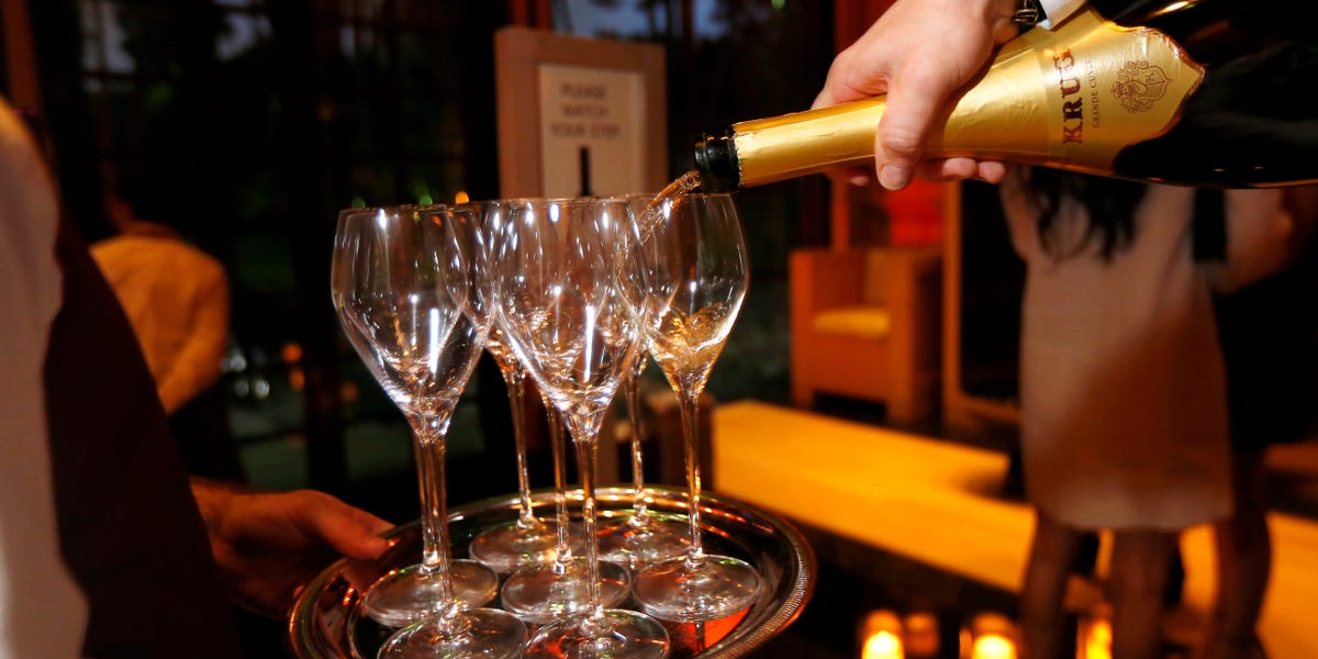 Champagne sales are tanking. An LVMH exec thinks people aren't happy enough to pop bottles.