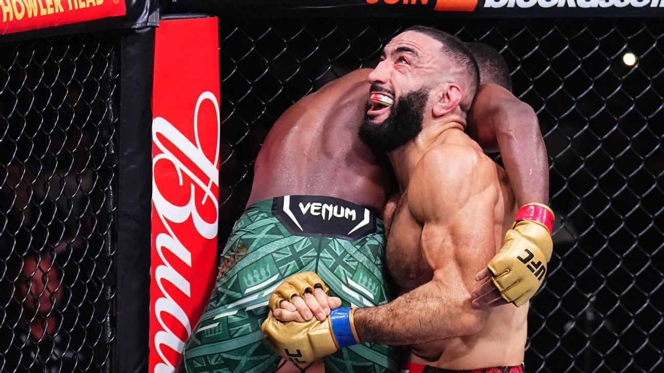 Muhammad wrestles away Edwards' UFC crown
