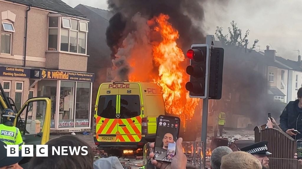 Police van set alight as protest breaks out in Southport