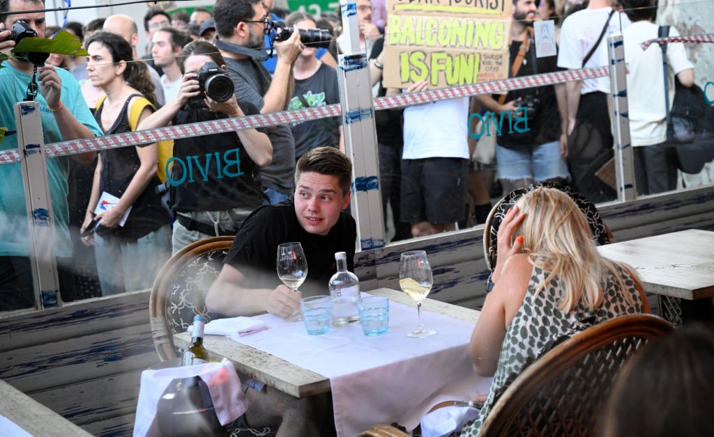 Why Protesters Are Squirting Water at Tourists in Barcelona