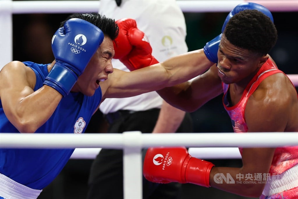 Boxer Kan vows to 'rise again' despite elimination in Paris Olympics