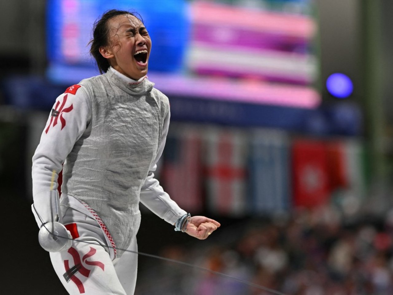 Fencer Daphne Chan wins in Olympic debut