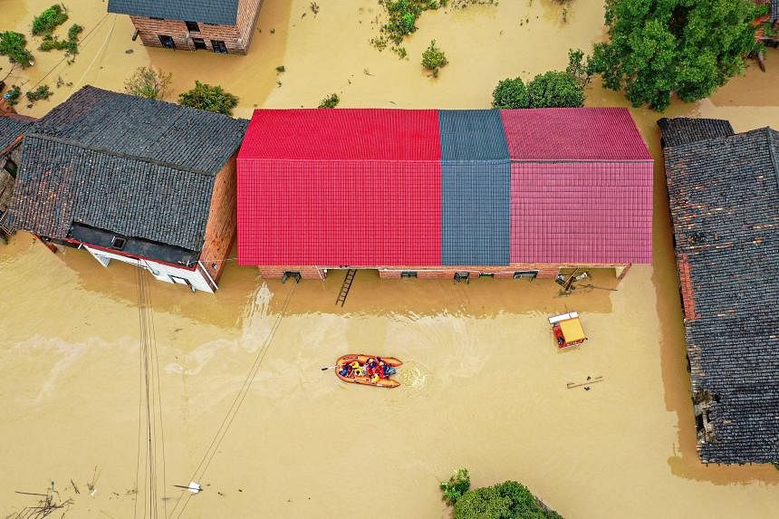 Four killed in rains, floods as remnants of weakened Gaemi lash south China