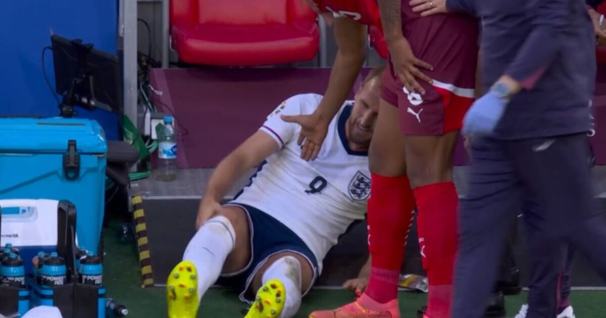 Harry Kane clattered and forced off with injury in extra-time of England vs Switzerland