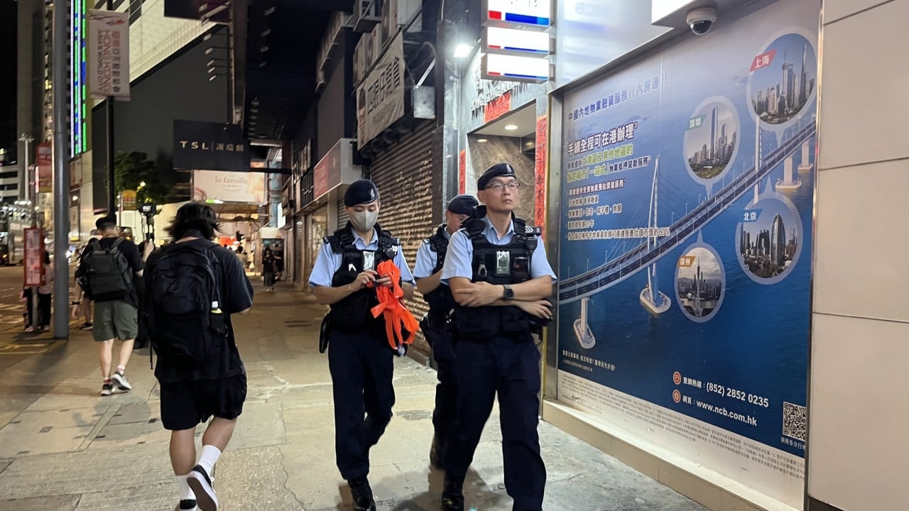Hong Kong police stop and search several people near scene of 2021 knife attack on officer