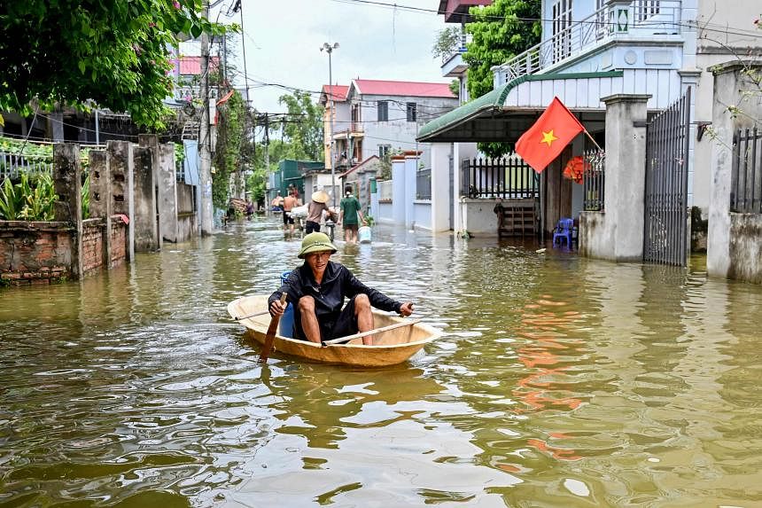 Hundreds living in flood waters in Vietnam following torrential rains