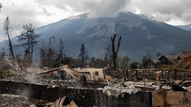Jasper's mayor visits the rubble of his home after massive Alberta wildfire destroys 358 properties
