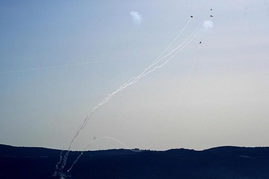 Lebanon's Hezbollah says it launched rockets and drones at Israeli military sites