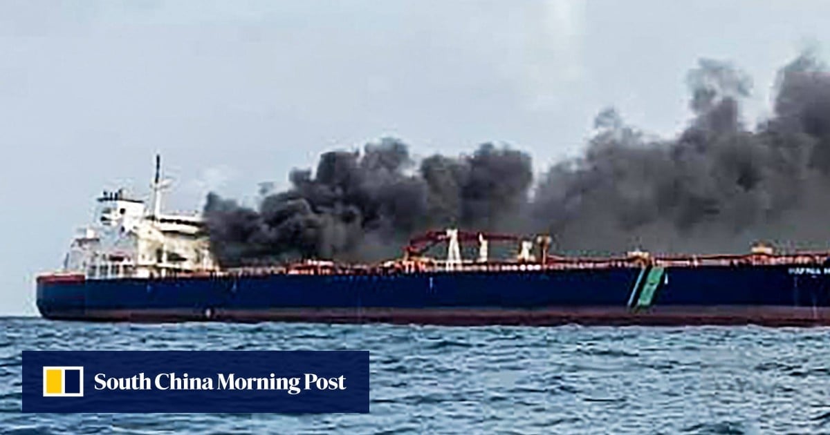 Malaysia says tankers that caught fire in collision near Singapore anchored in its waters