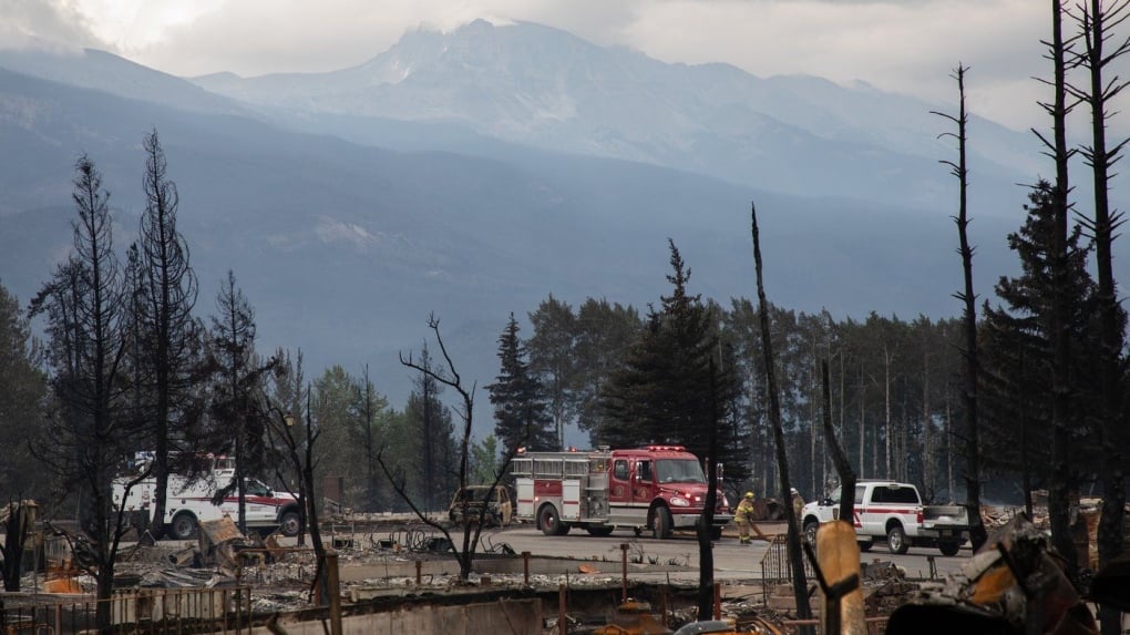 Milder weather gives crews chance to make progress in fighting Jasper wildfires