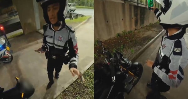 'Mini heart attack': Motorcyclist gets pulled over by traffic police, only to be given goodie bag
