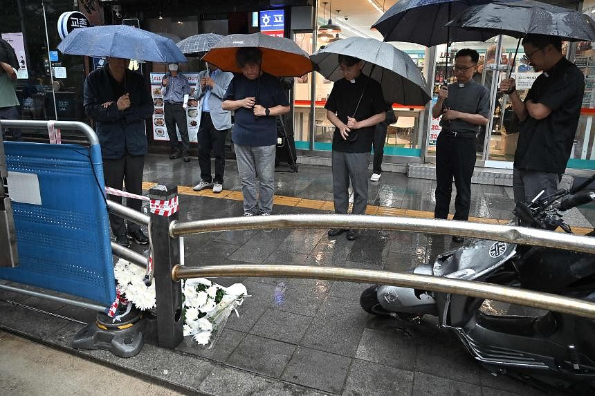 Passers-by, families mourn tragic deaths of 9 killed by driver in South Korea