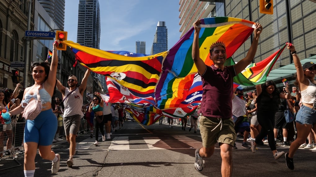 'Peace, love, unity and respect': Thousands celebrate Pride in downtown Toronto