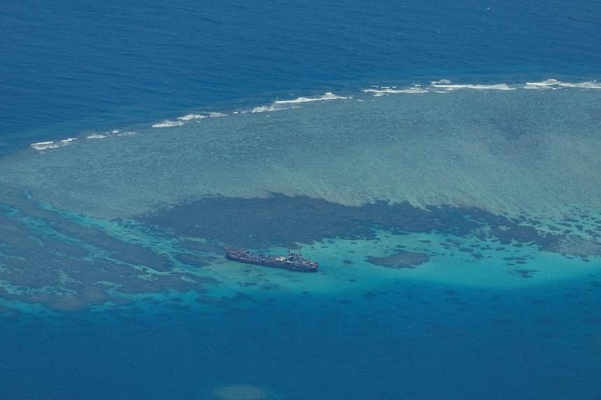 Philippines says has 'arrangement' with Beijing on South China Sea, but no ship inspections