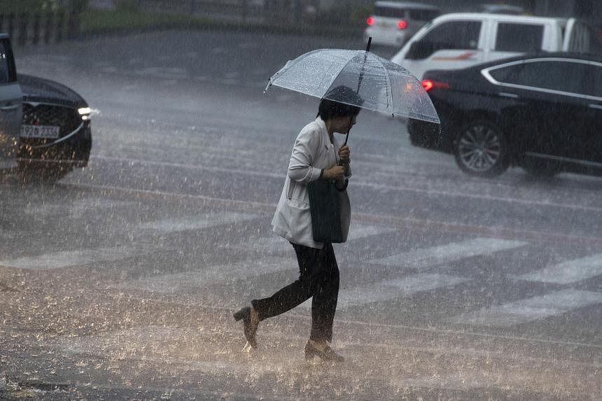 South Korea monsoon rains spur evacuations, disrupt flights