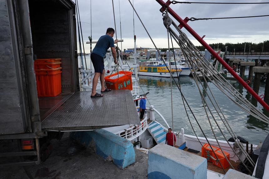 Taiwan says China coast guard harasses fishing boat