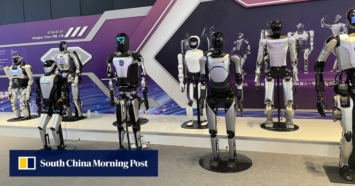 Tesla shows its humanoid robot Optimus at China AI conference, but behind glass