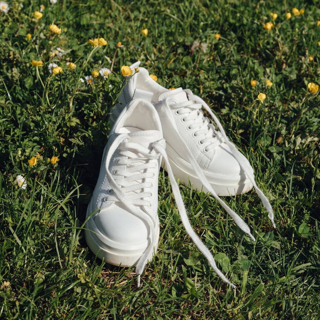  The Best White Sneakers That Go With Everything, From Denim To Dresses 