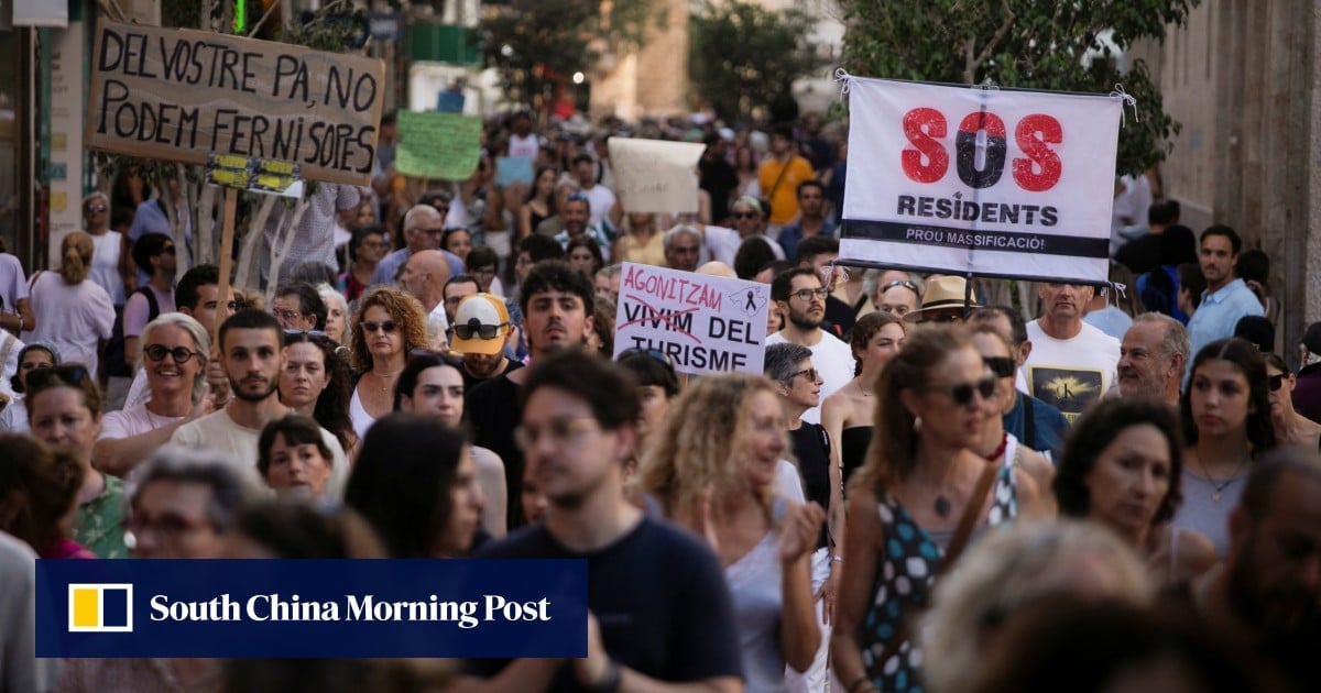 Thousands protest against mass tourism on Spanish island of Mallorca