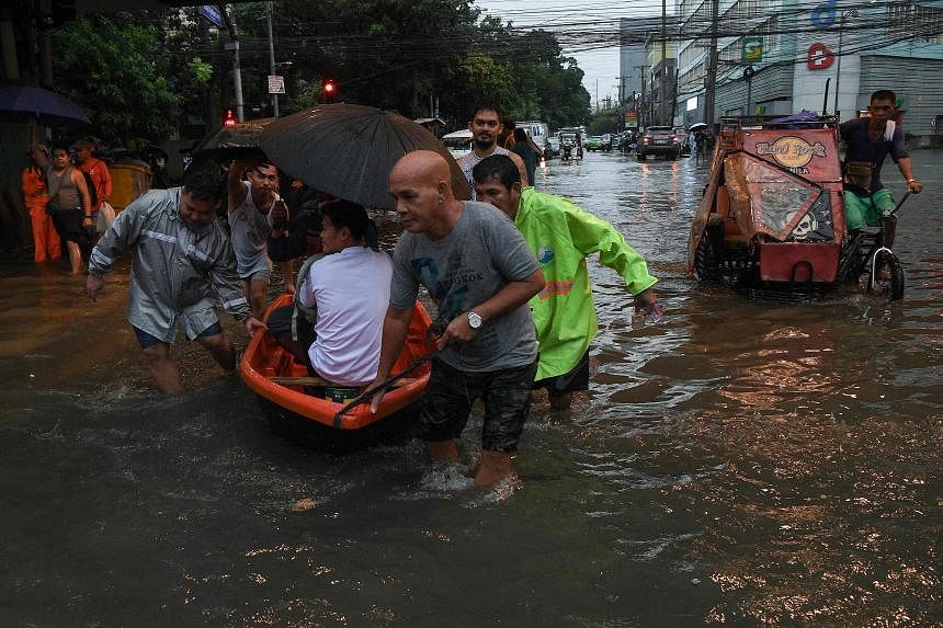 Typhoon Gaemi forces Philippines to halt work, schools, market trading
