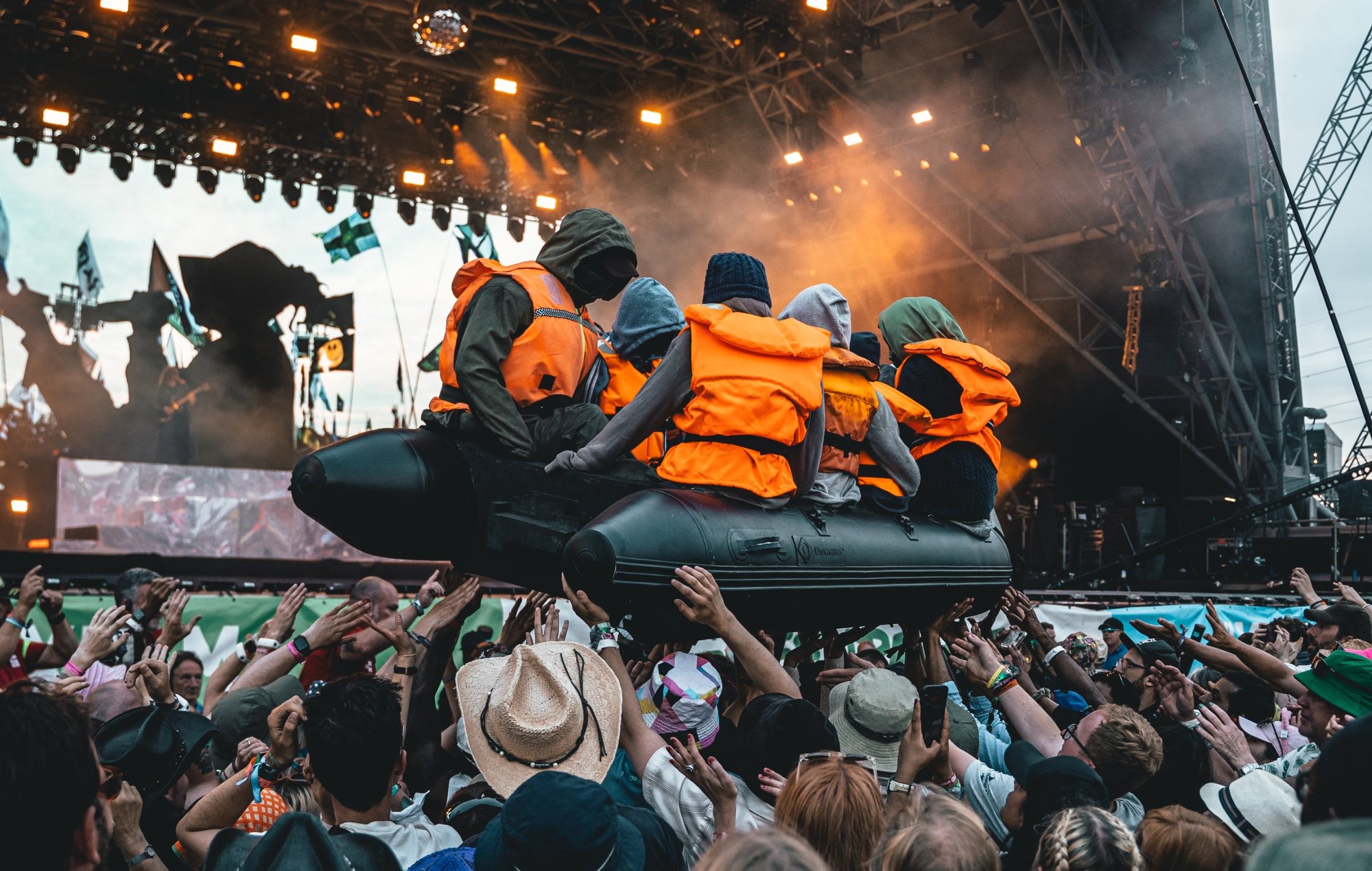 Watch: Banksy shares footage of IDLES immigrant boat stunt from Glastonbury 2024