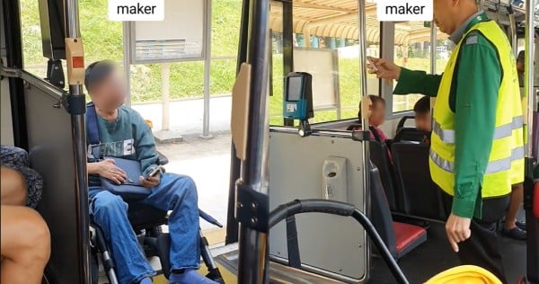 'You're the one wasting time, not me': Wheelchair-bound man argues with bus driver after getting stuck at rear door 