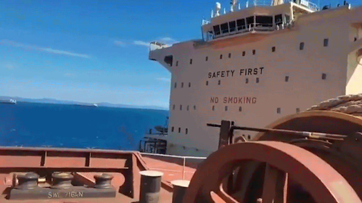A dramatic crash between two massive cargo ships was caught on video