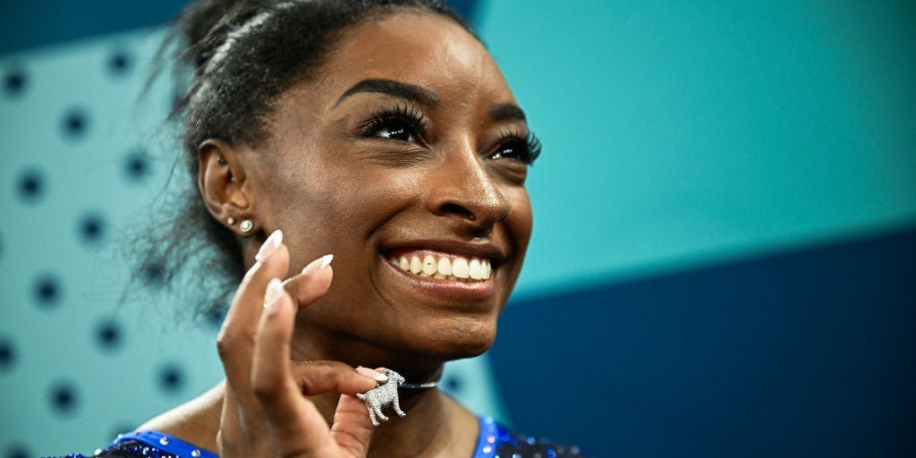 Simone Biles wore a goat necklace encrusted with 546 diamonds while accepting her gold medal at the Paris Olympics