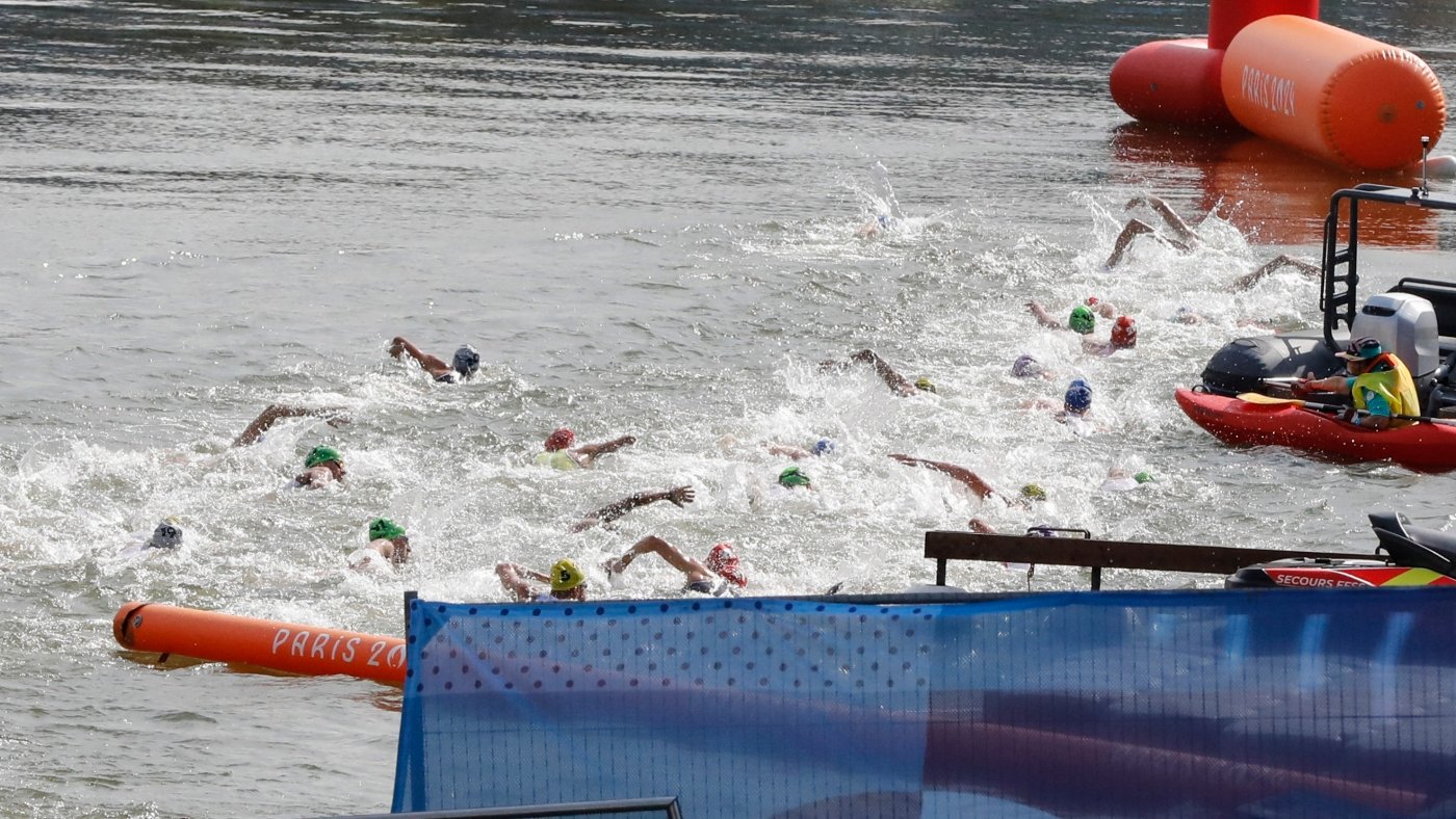 Belgian Olympic team bows out of triathlon as teammate falls ill after swim in the Seine