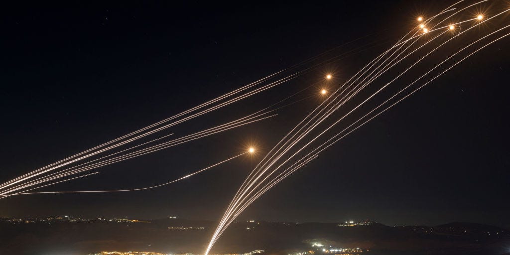 Video shows Israel's Iron Dome missile defense system intercepting Hezbollah rockets overnight as fears over wider conflict mount