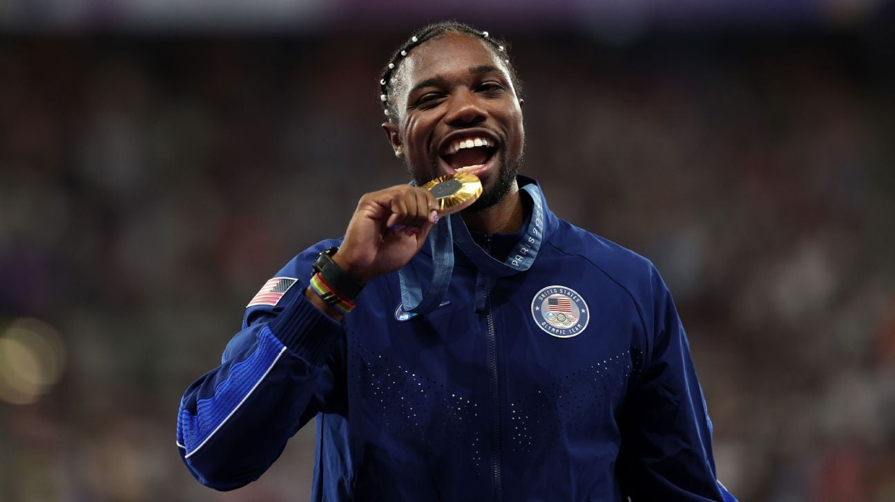 'I'm a good boyfriend:' Lyles' celebration after winning gold including helping girlfriend