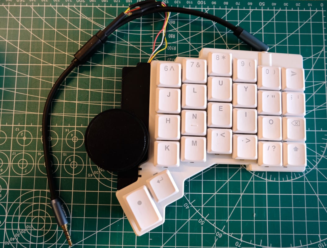 Tiny Trackpad Fits On Ergonomic Keyboard