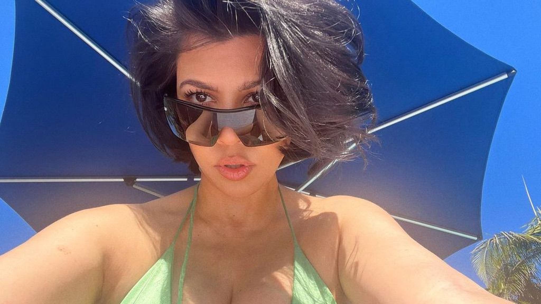 Kourtney Kardashian Captured Breast Feeding Rocky in Instagram Pics