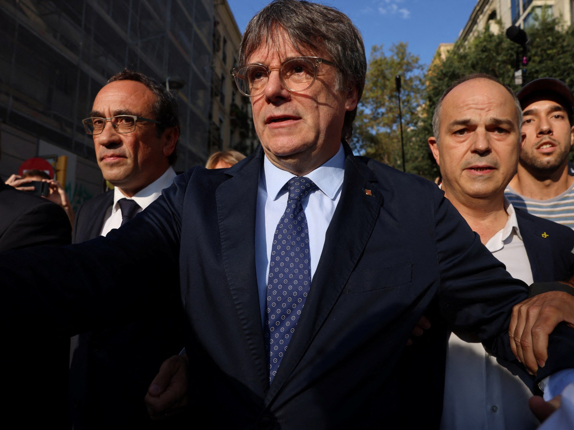 Catalonia ex-leader Puigdemont returns to Spain despite arrest warrant