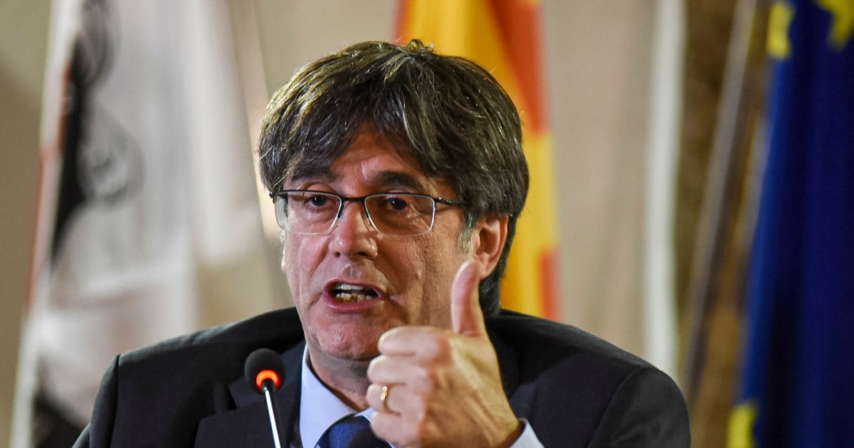 Ex-Catalan leader Puigdemont headed back to Spain despite fear of arrest