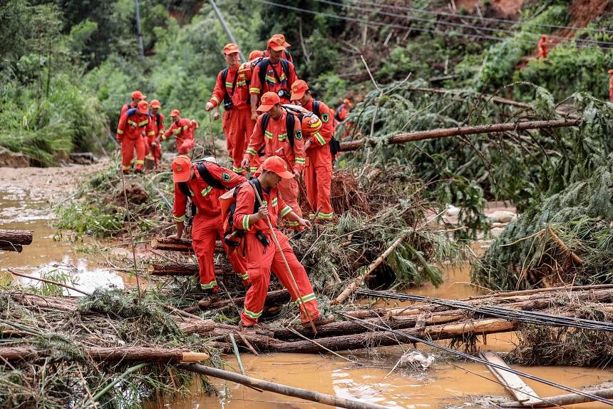 30 dead, dozens missing after torrential rain in central China