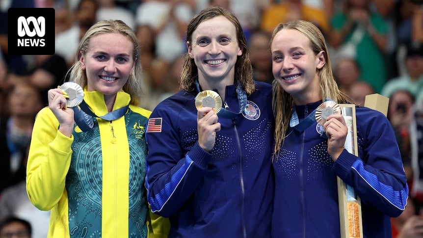 Ariarne Titmus claims silver in the 800m freestyle final behind Katie Ledecky, as American disqualification hands Kaylee McKeown a bronze