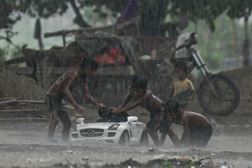 At least two dead in India's capital Delhi, schools shut after heavy rain