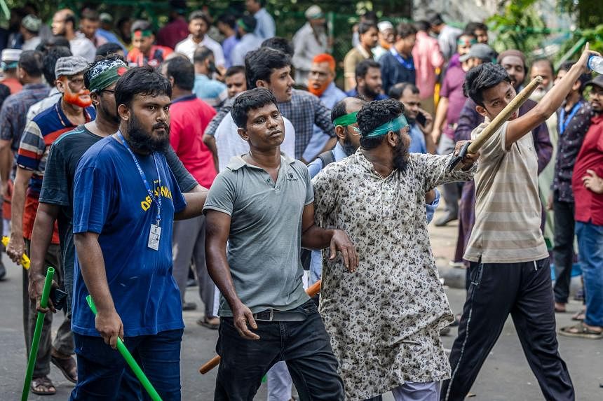 Bangladesh mob beats suspected supporters of ex-PM Hasina after rally call