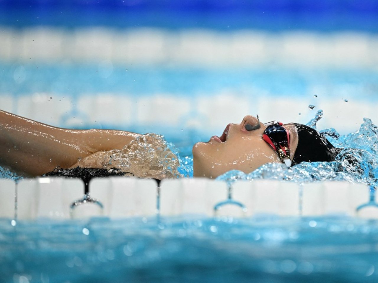 Cheung, Ho complete Olympic swimming events