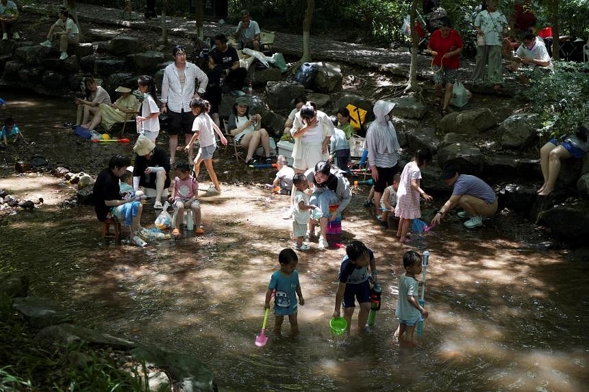 Chinese megacity Hangzhou limits outdoor lighting as record heat strains grid