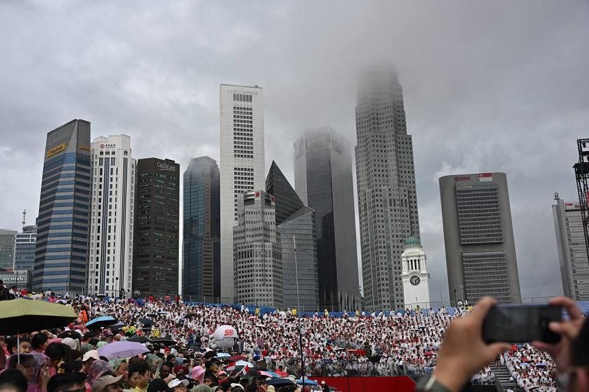 Despite the rain, Singapore gears up for NDP celebrations at the Padang and Promontory @ Marina Bay