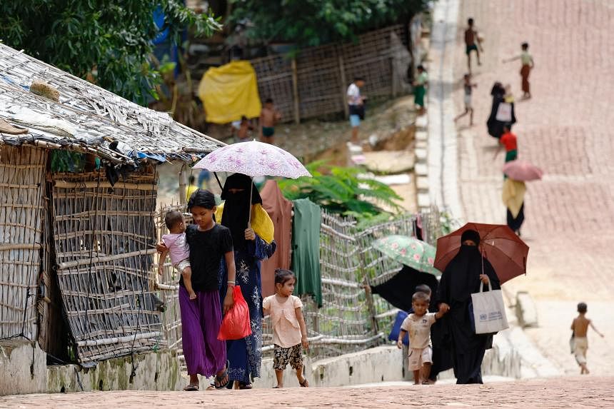 Dozens of Rohingya, including children, killed in drone attack while fleeing Myanmar, witnesses say