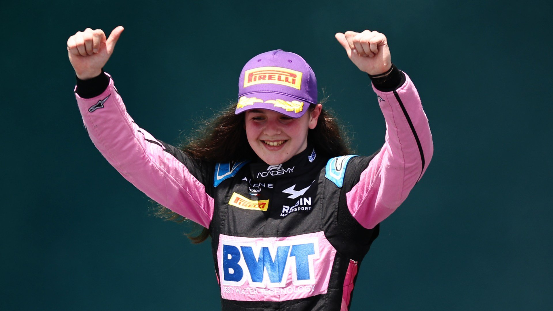 F1 Academy racer Abbi Pulling, 21, makes history as she becomes first woman ever to win British F4 race