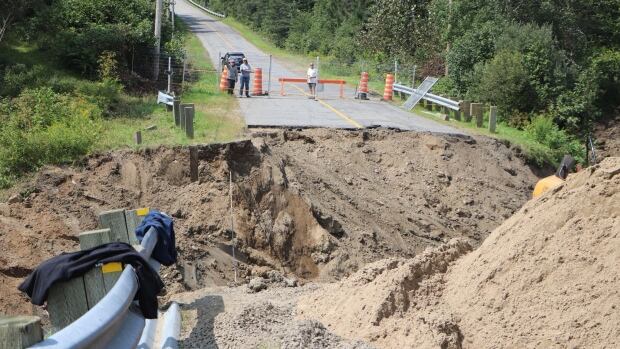 Floodwaters washed away the only road out, so this Quebec city set up an emergency water taxi