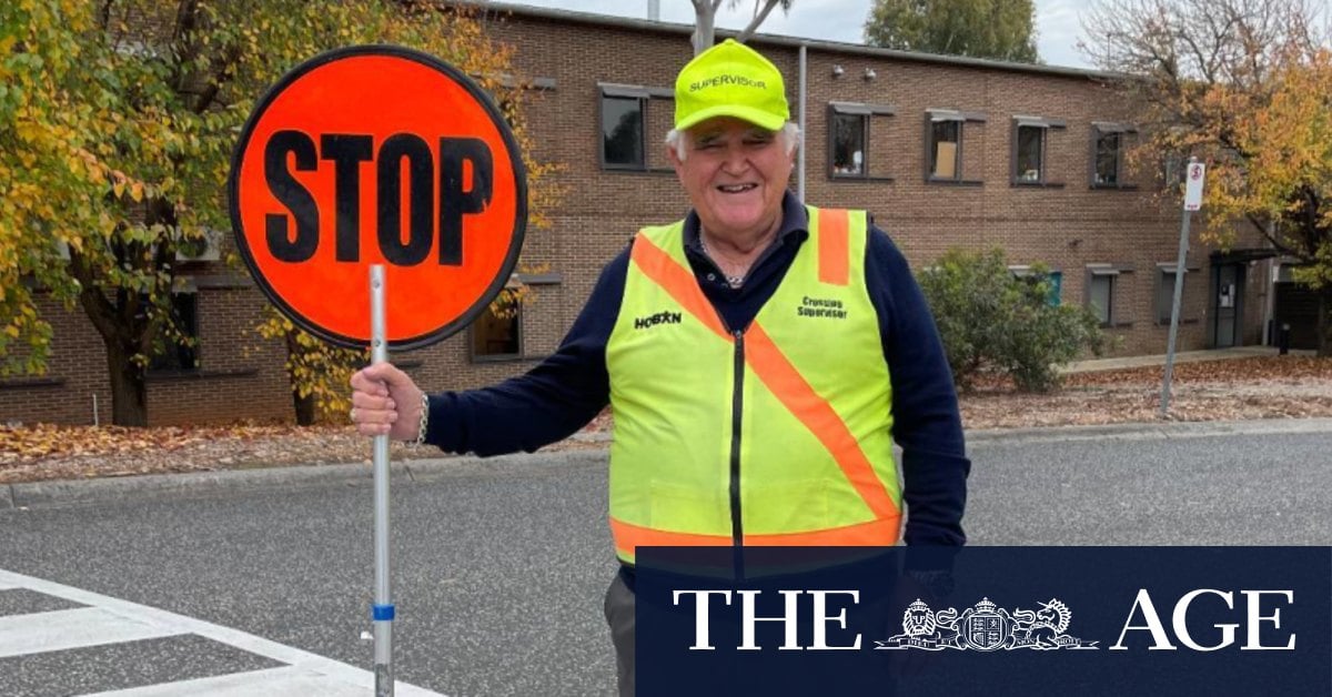 High-five ban for beloved lollipop man sparks petition