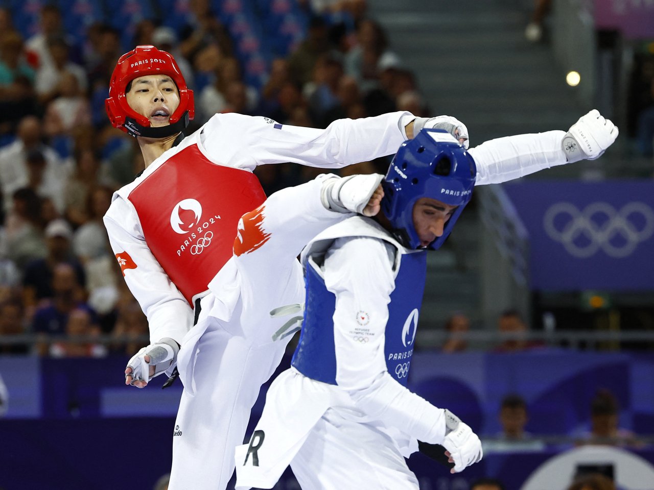 HK's Lo Wai-fung advances to round of 16 in Taekwondo