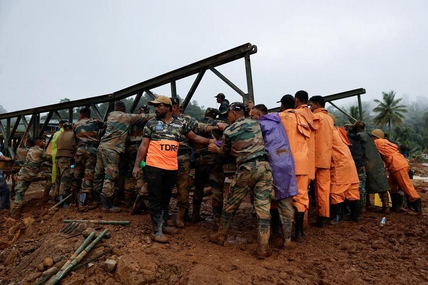 India landslides rescue operations speed up with new metal bridge